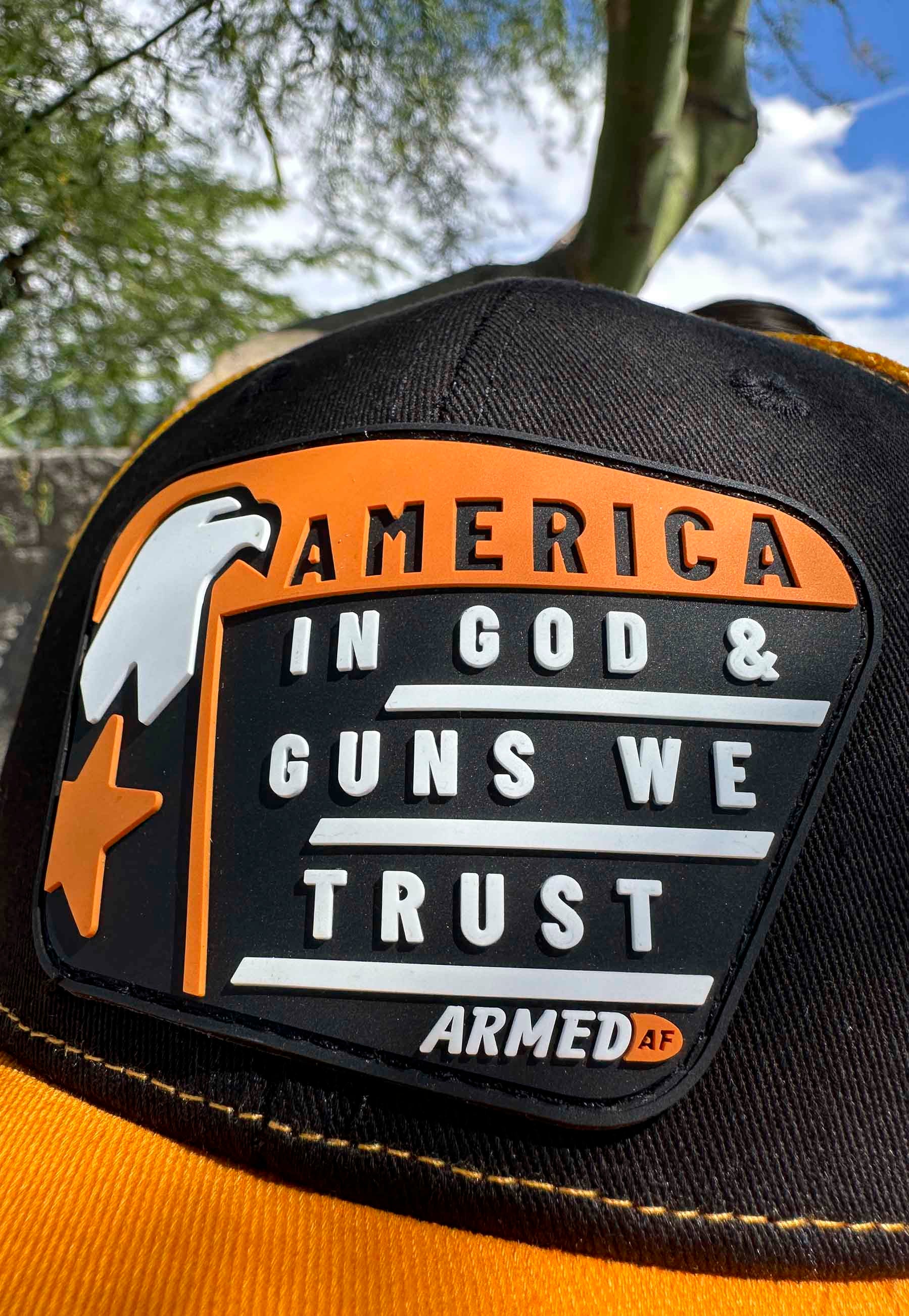 Closeup of PVC patch on God and guns hat from ArmedAF® brand