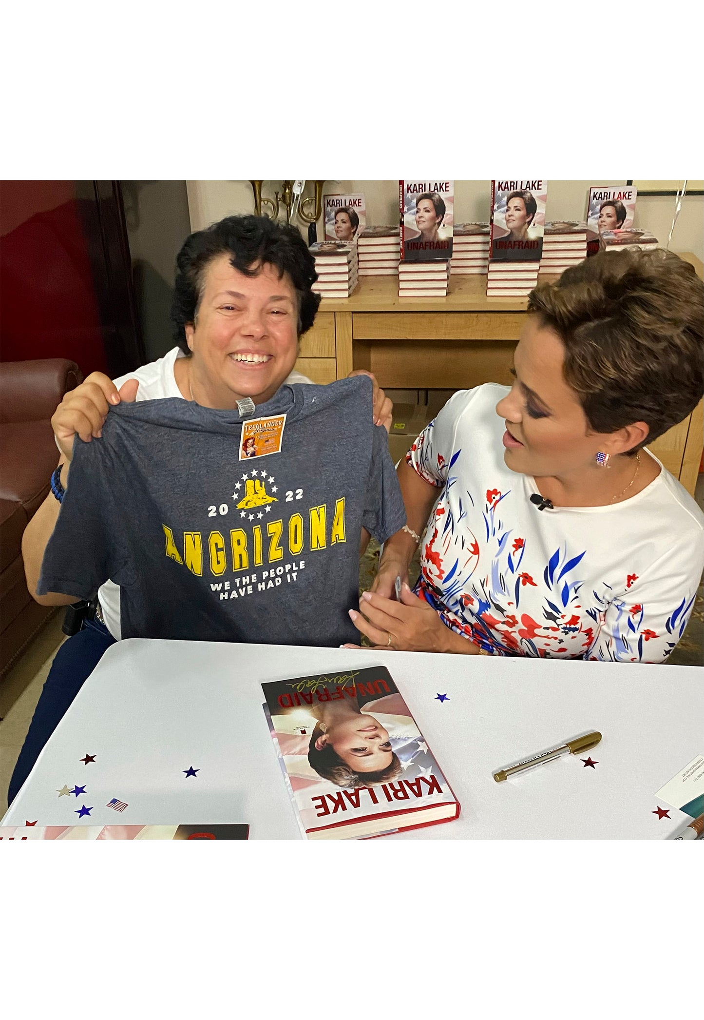 Kari Lake with Angrizona t-shirt at book signing