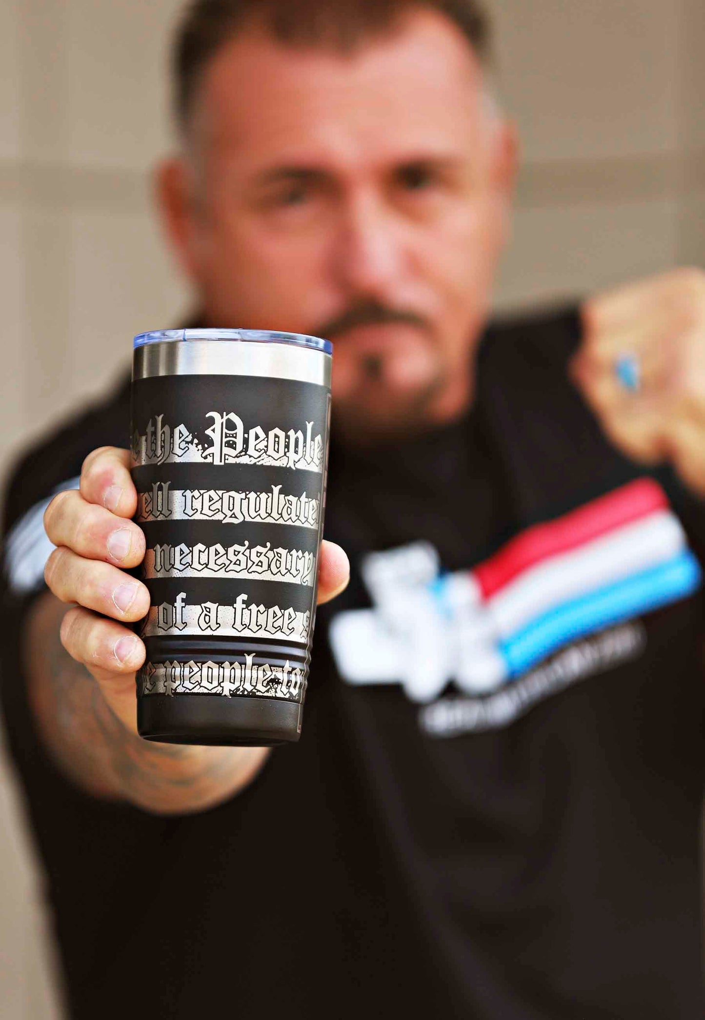 Second amendment tumbler held by MMA champ shannon ritch