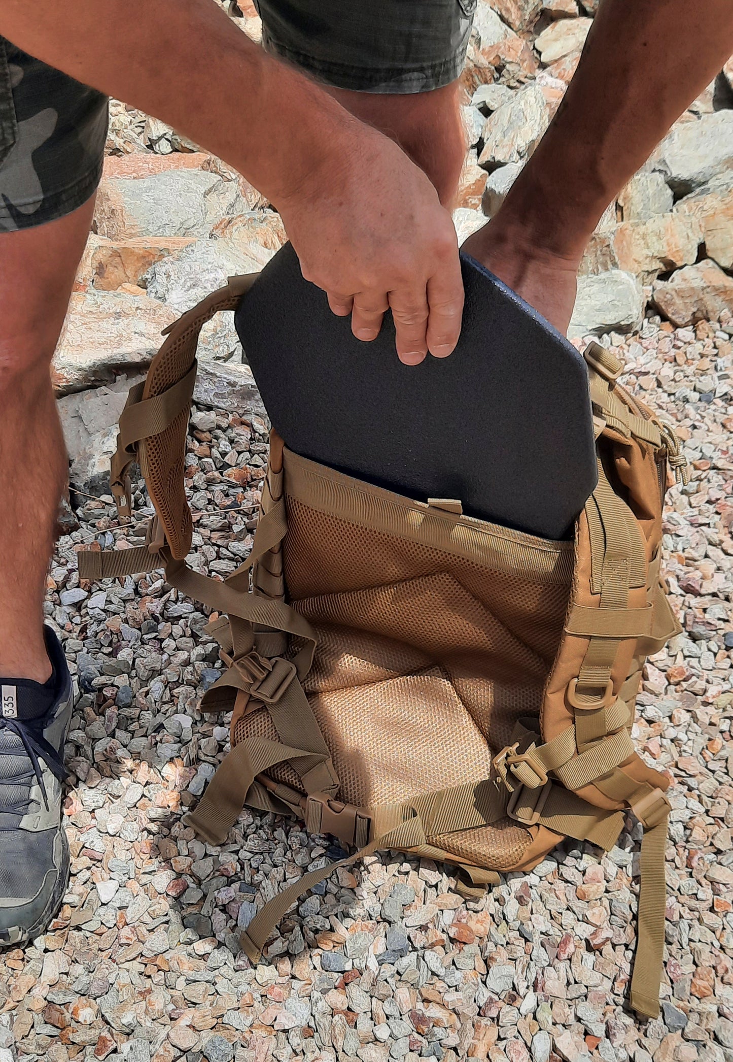 Demonstration of plate carrier in backpack