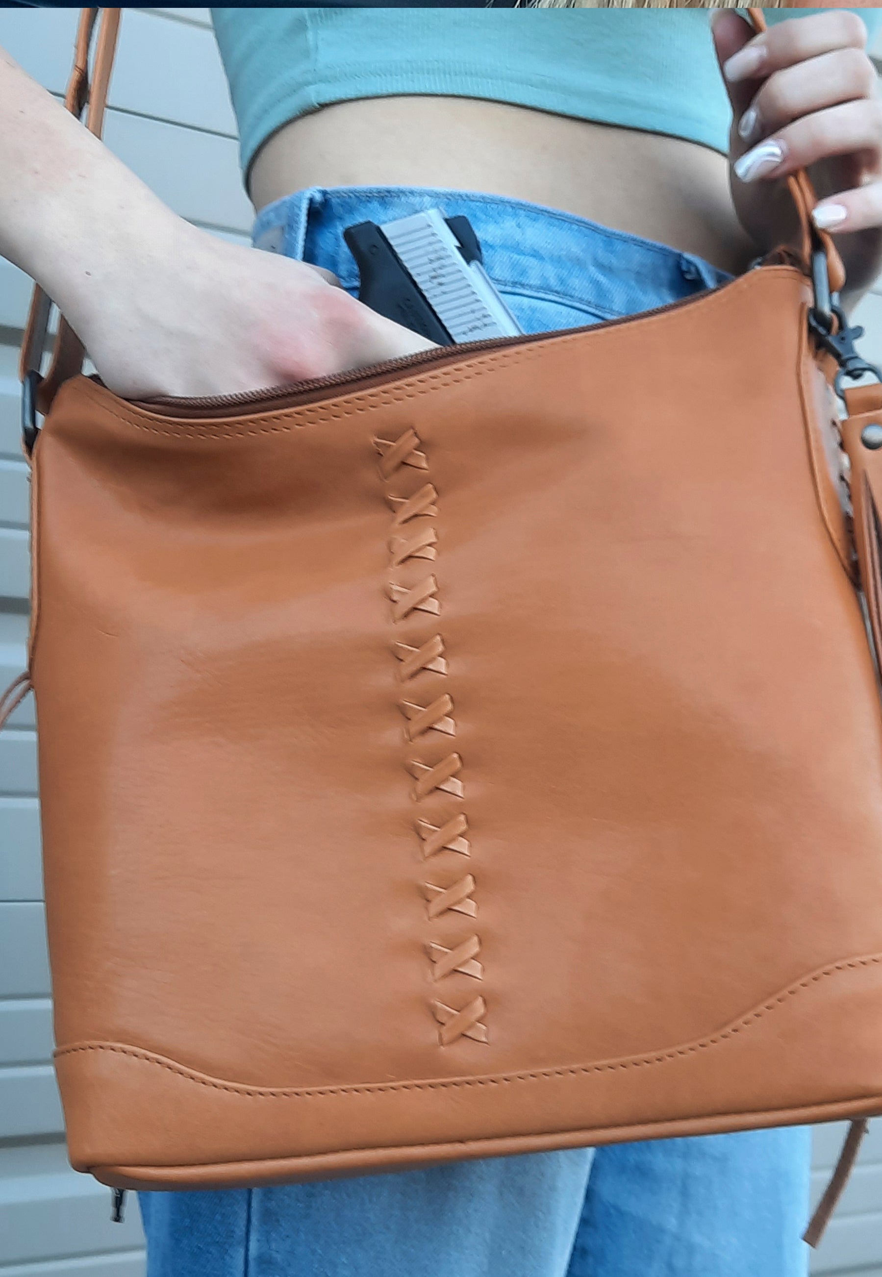 model wearing conceal carry purse