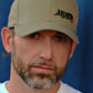 Male model wearing ArmedAF® logo hat in coyote brown