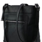 Side view of black leather conceal carry hand bag