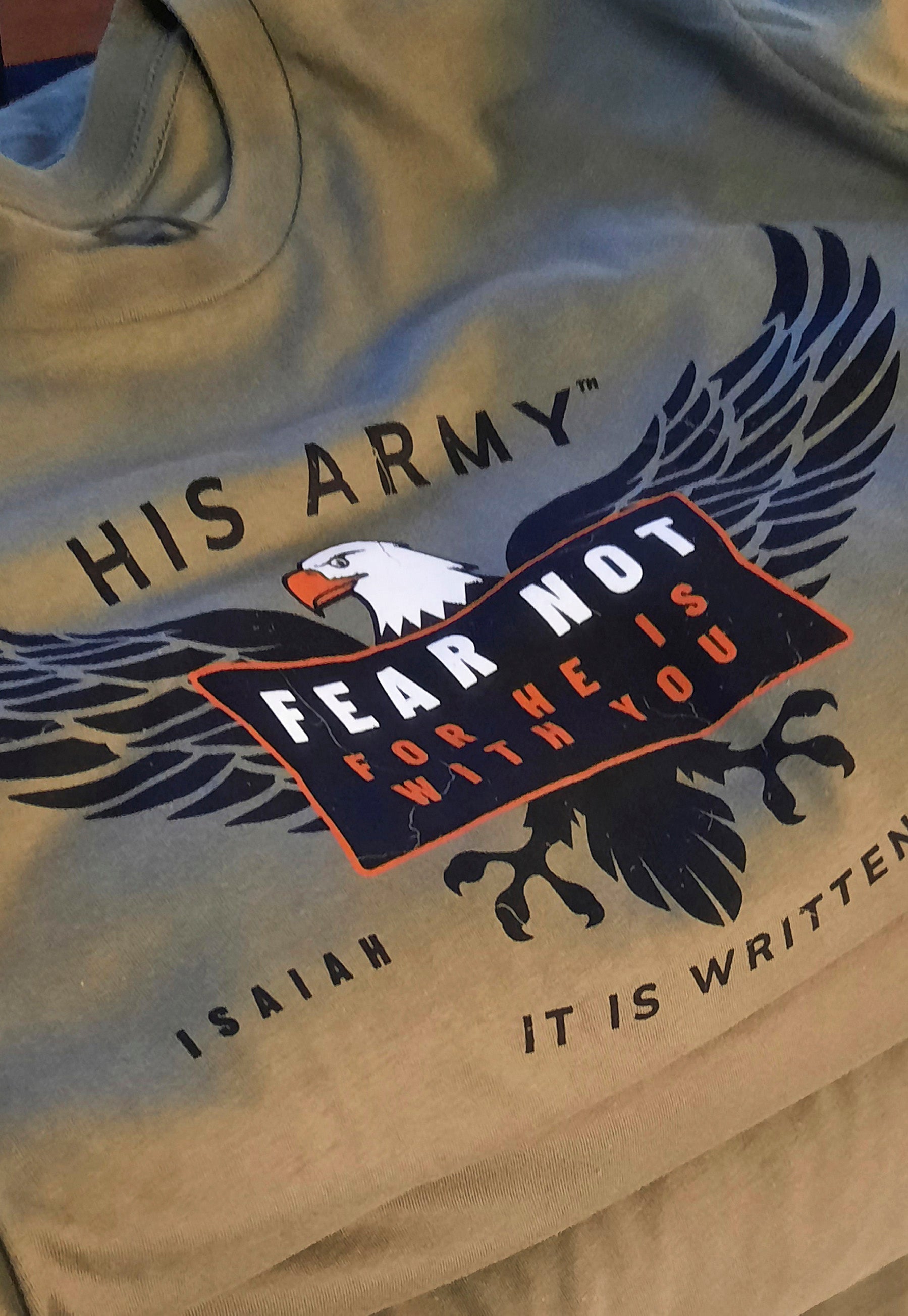 Stack of Christian patriot tee shirts in print shop