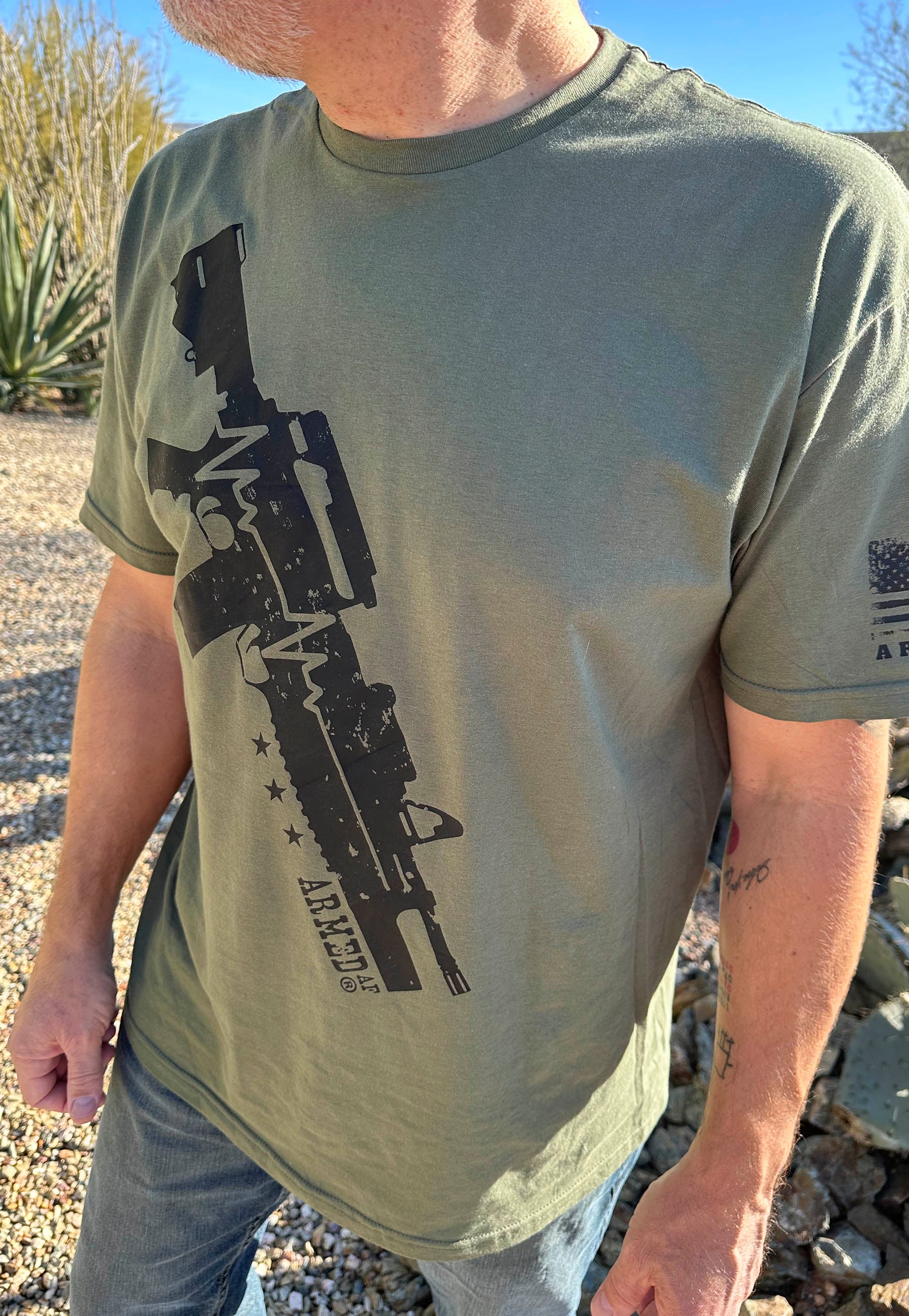 Rifle on a sling t-shirt on model
