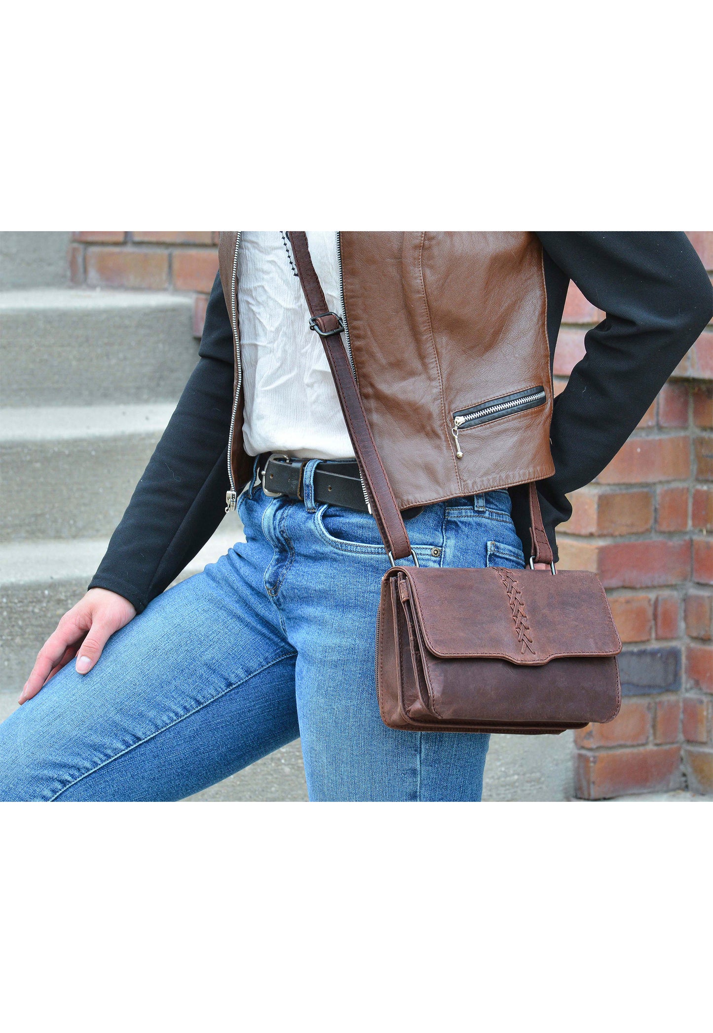 model wearing concealed carry fanny pack on belt