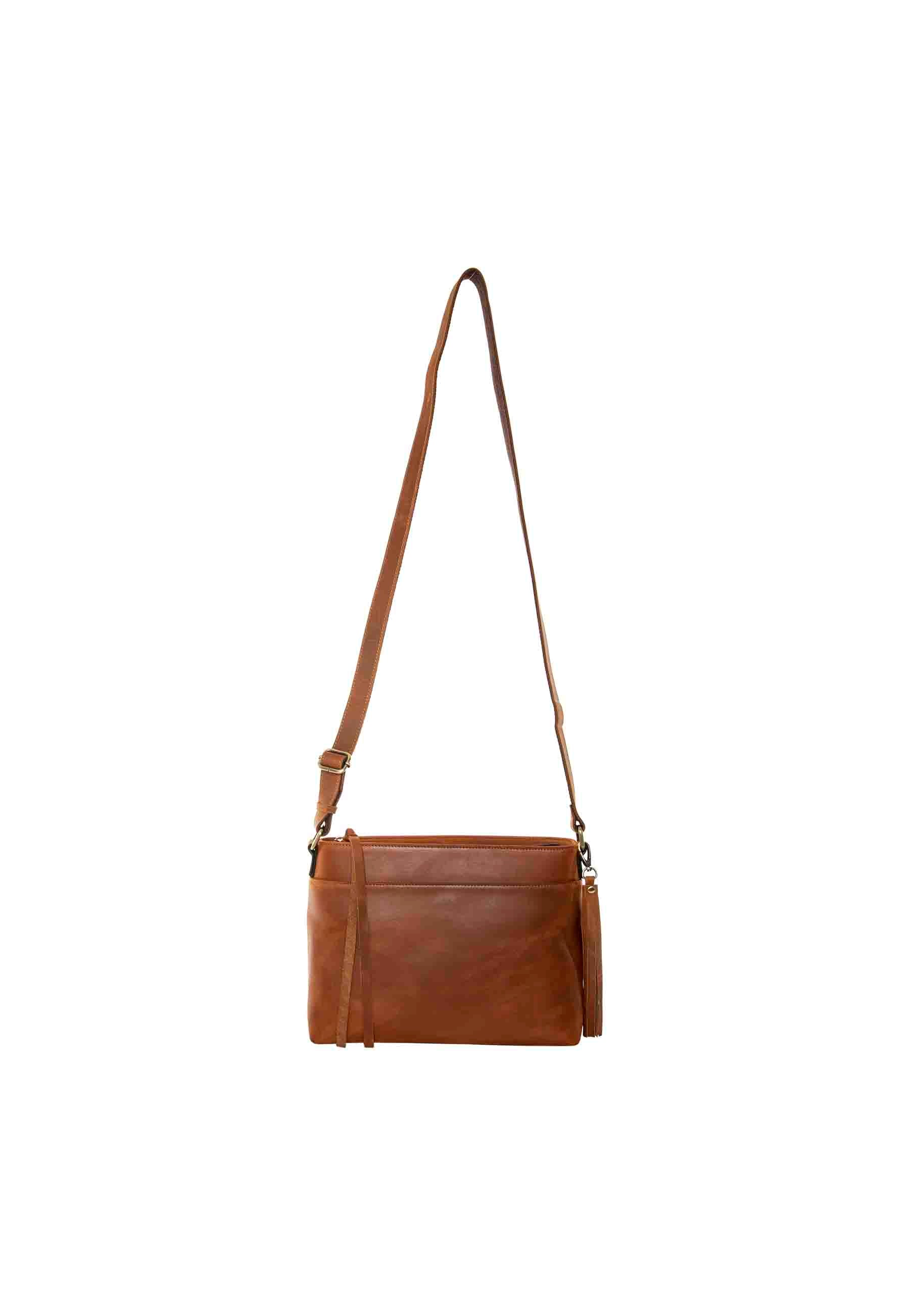 full crossbody view of pistol purse in leather
