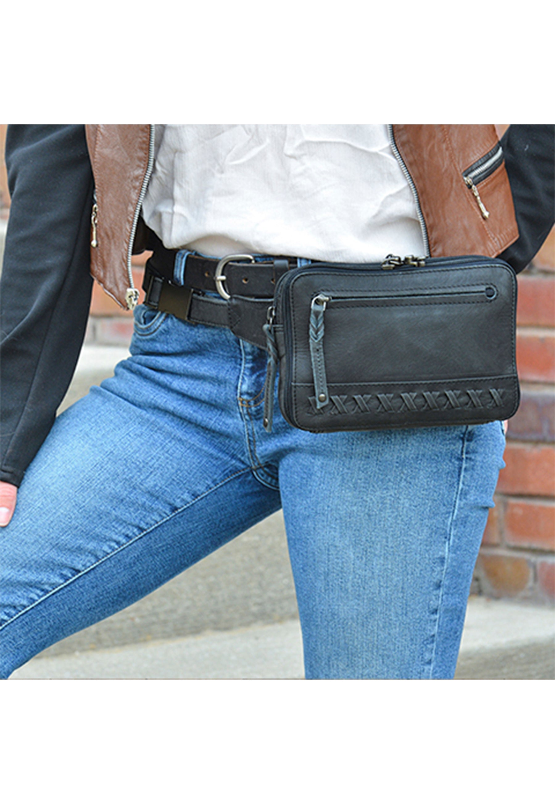 Model with leather concealed carry pack on her hip