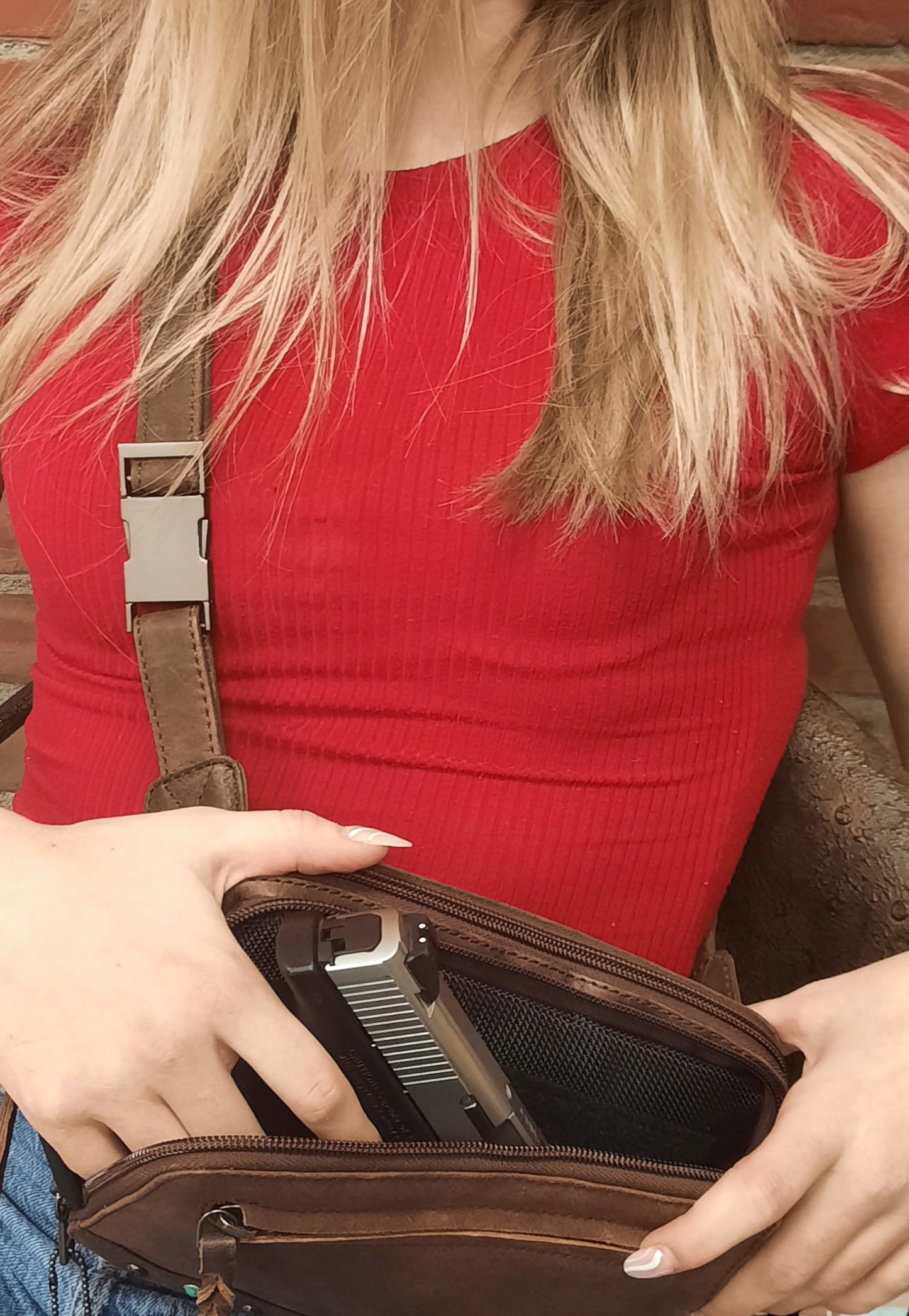 Model with leather concealed carry fanny pack