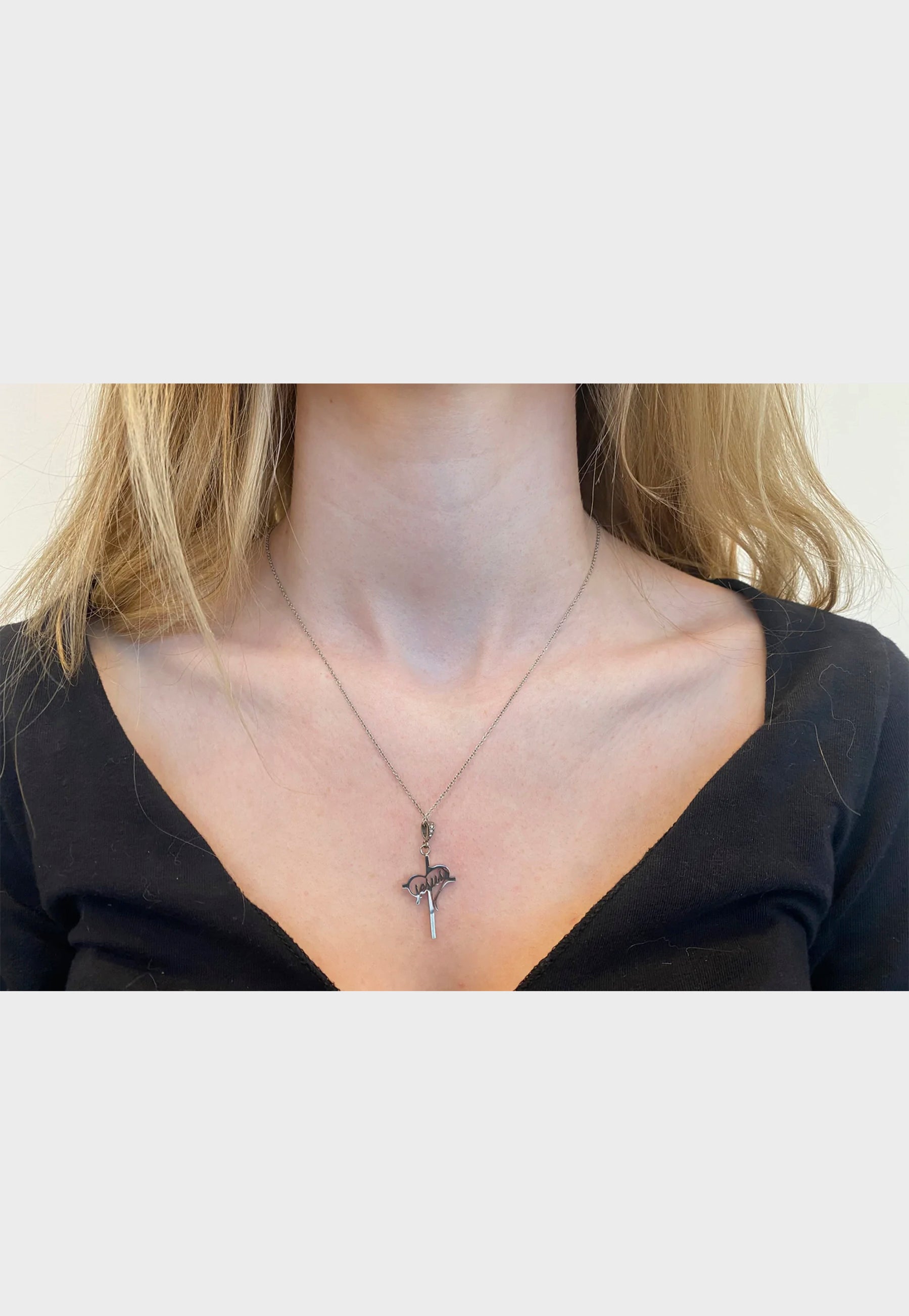 model wearing womens christian heart necklace