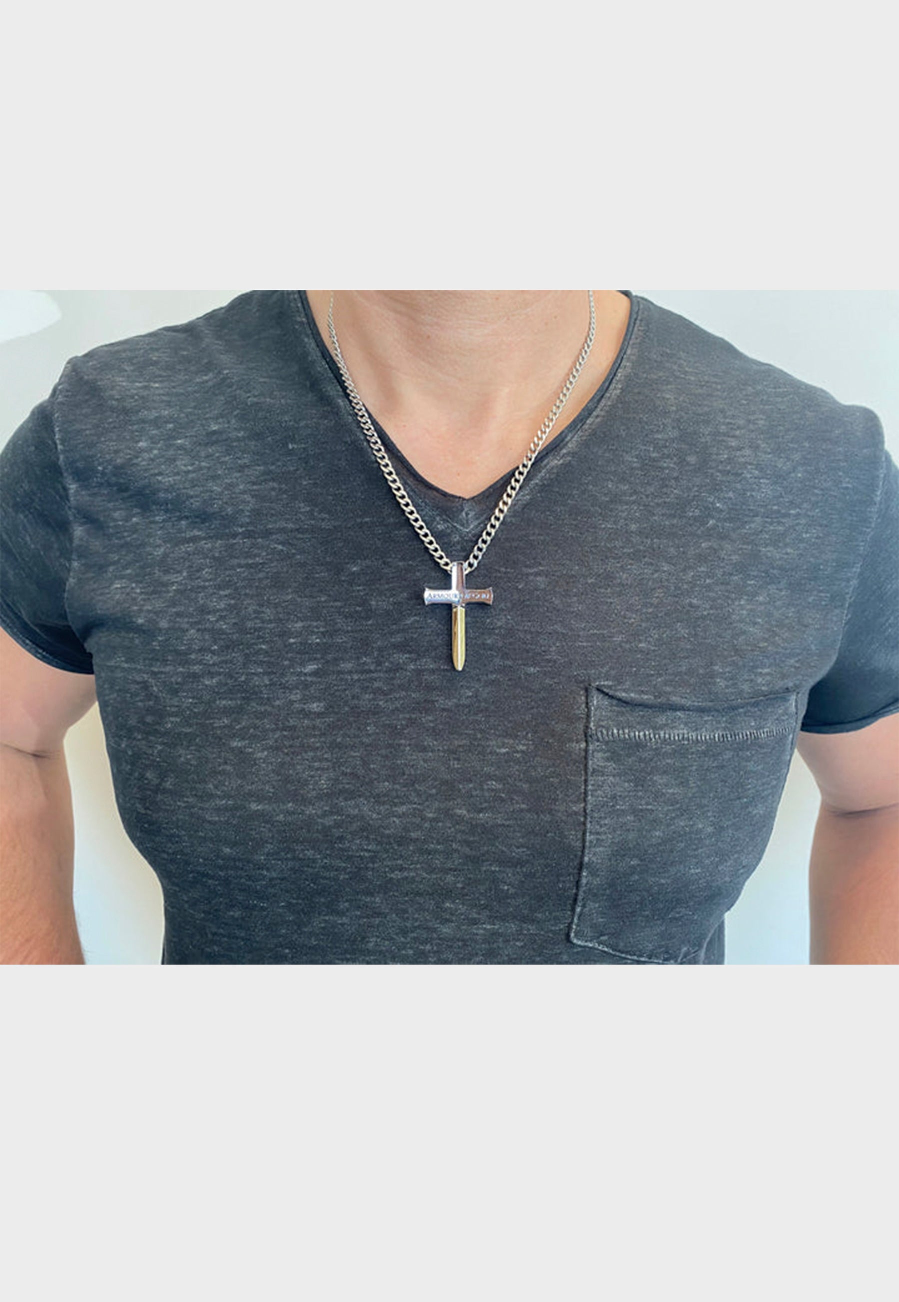 Model wearing Christian cross necklace