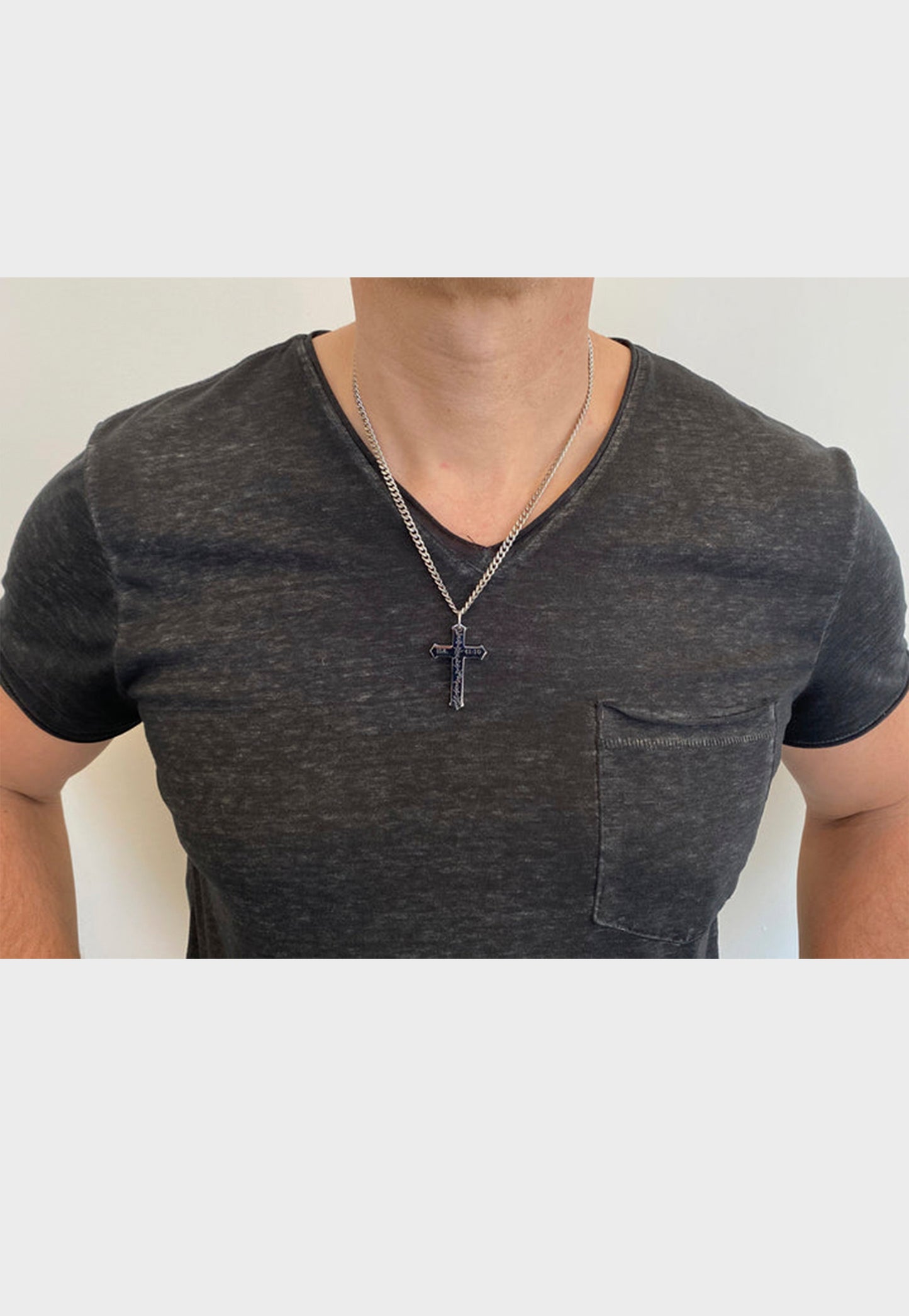 Christian necklace on male model