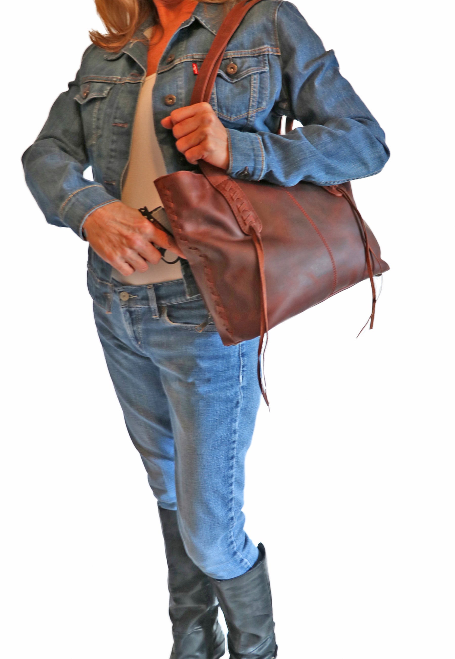 Model demonstrating leather conceal carry purse