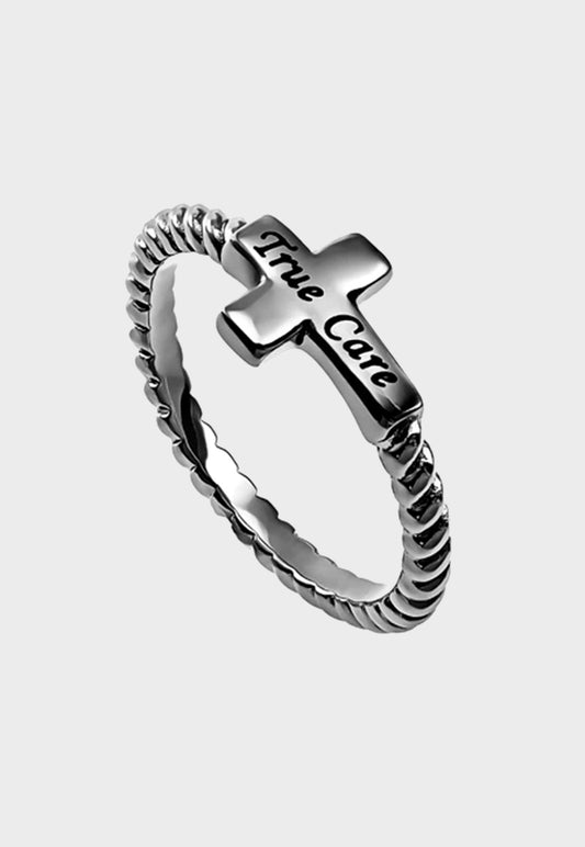 Women's Christian ring with True Care inscribed on cross