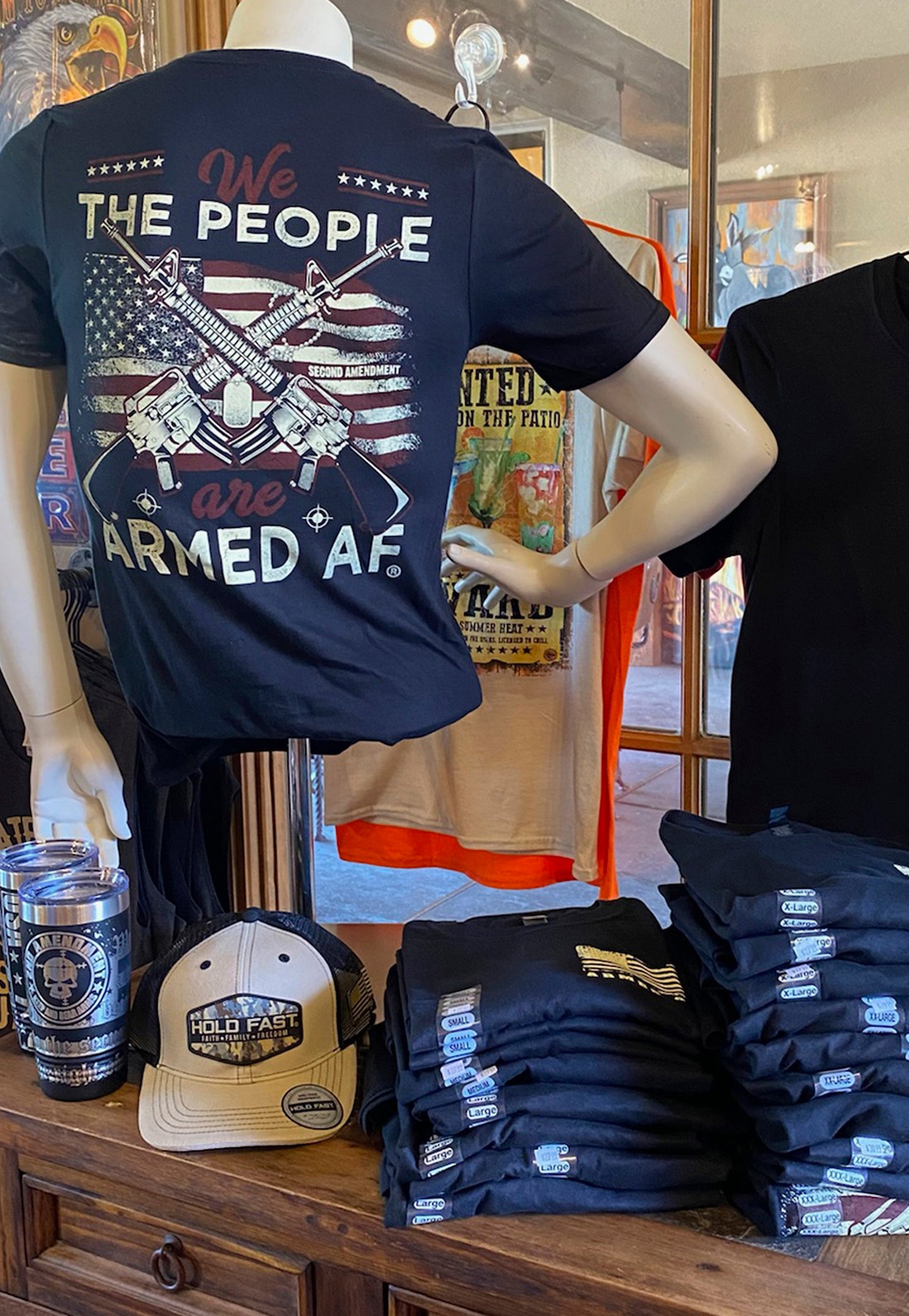 ArmedAF® brand t-shirt in retail store on display